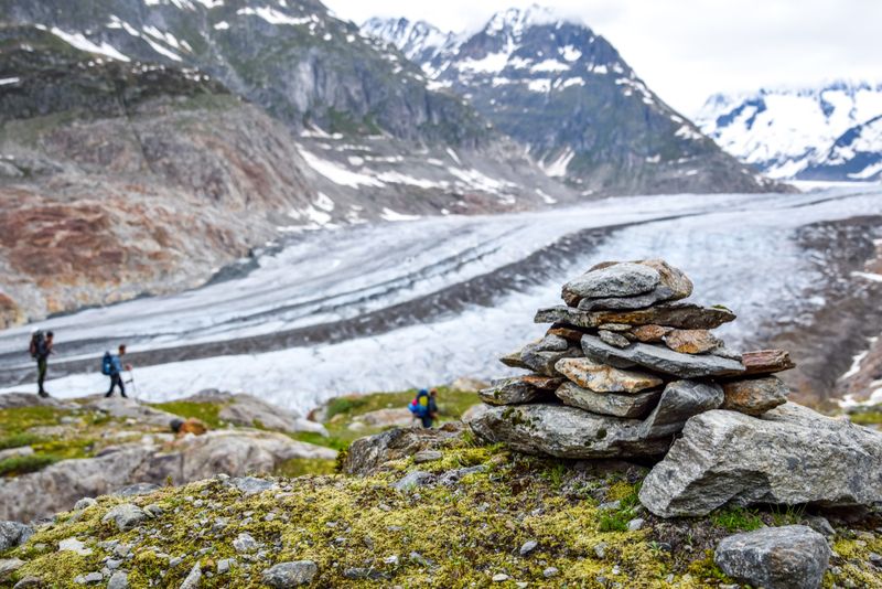 Mountaineers clamber around the Aletsch glacier, the largest glacier in the European Alps, located in the Bernese Alps in Switzerland. 