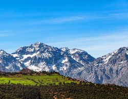 Morocco High Atlas Mountain range. Springtime. Blue sky. Bright sunshine.