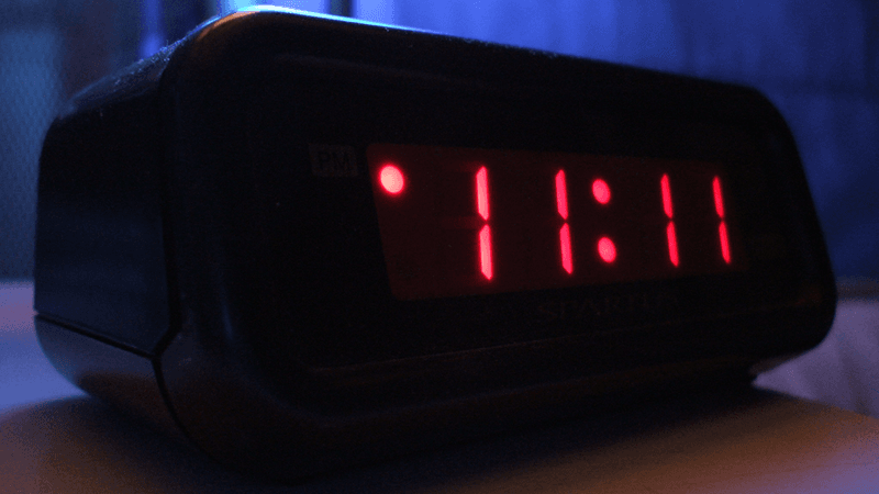 The time "11:11" on a digital clock.