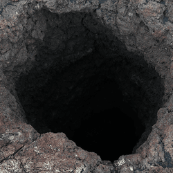 A hole in a rock.